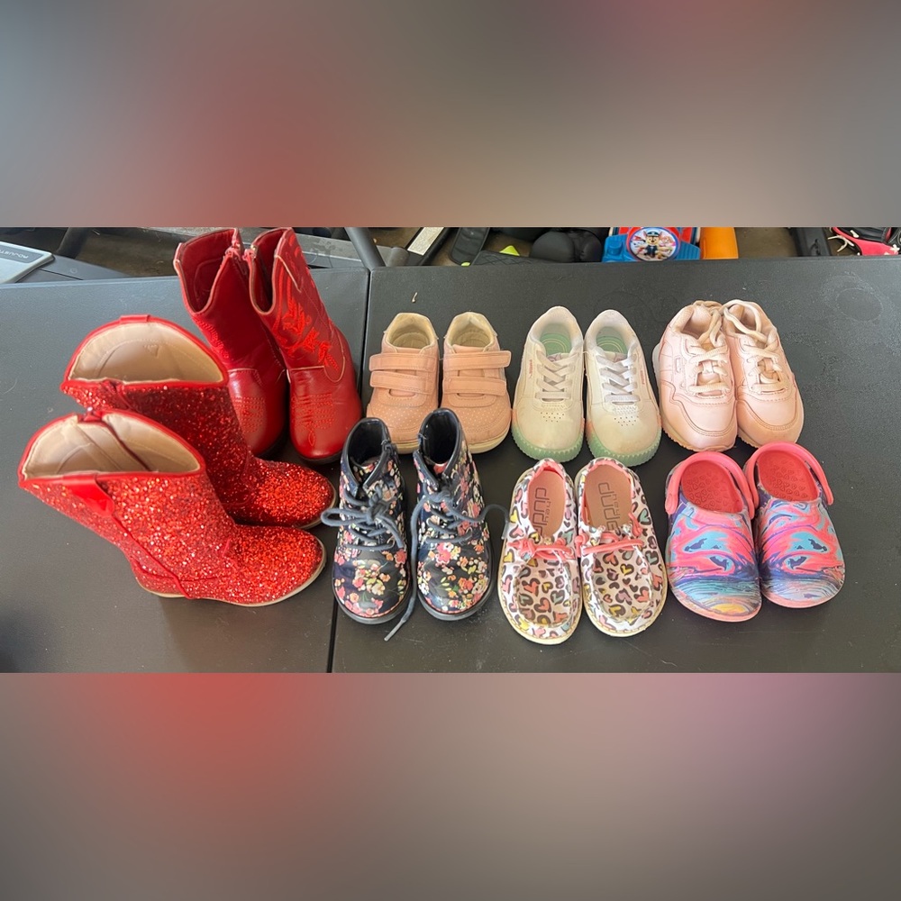 Multiple pairs of toddler shoes. Size range C5-6